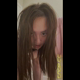 Emi stands in a black top with her bare ass to the camera and spreads her rotten egg stink, then leans in close to the camera and makes faces. Vertical format video. Over 17 minutes.